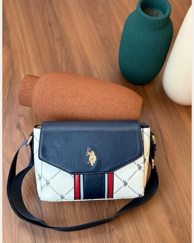 شنطة كروس بغطاء وحزام عريض