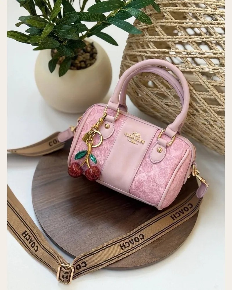شنطة يد أسطوانية صغيرة بحزام كتف 2