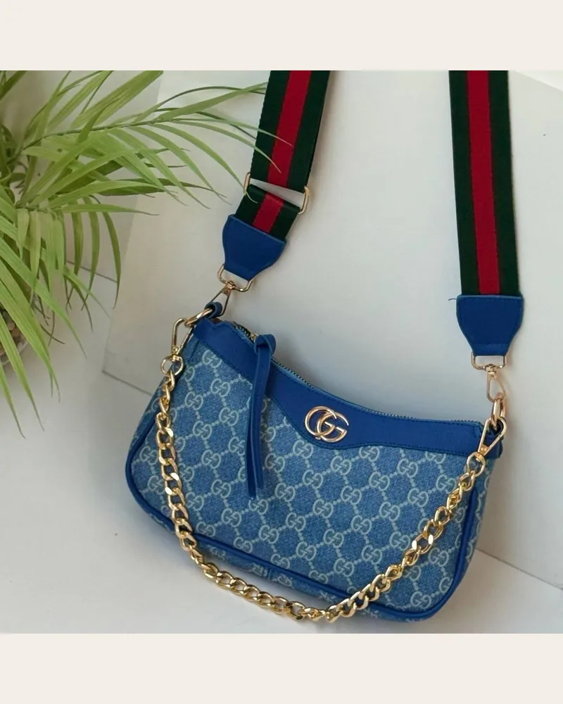 شنطة كتف منقوشة بسلسلة ذهبية 1