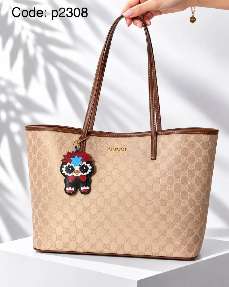 شنطة توت قماش بنقشة مونوجرام 3