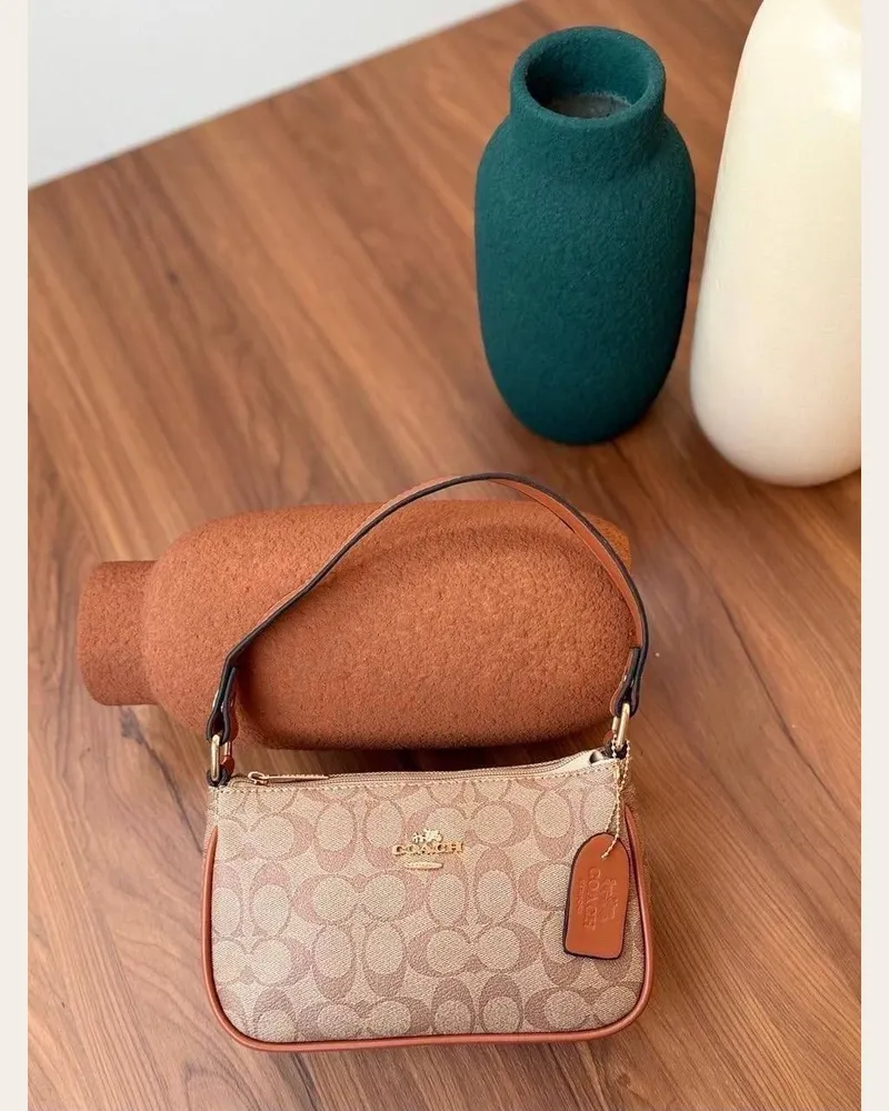 شنطة كتف صغيرة بسحاب 2