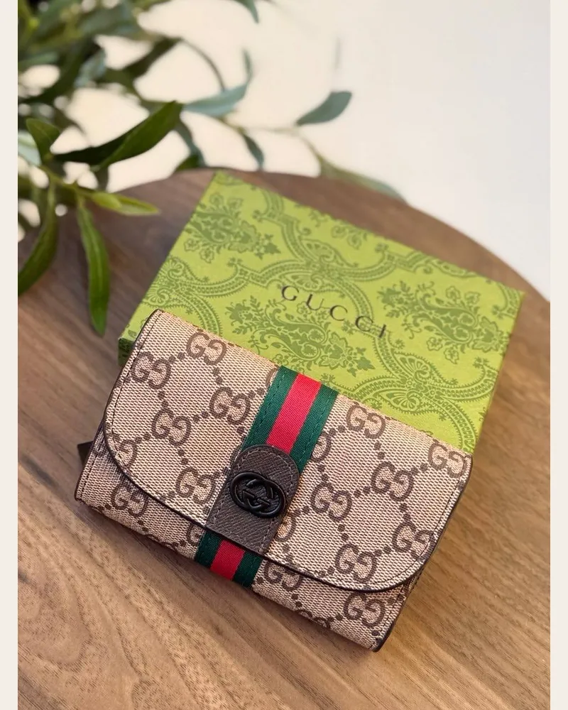 محفظة كانفاس بقلاب وشريط ملون