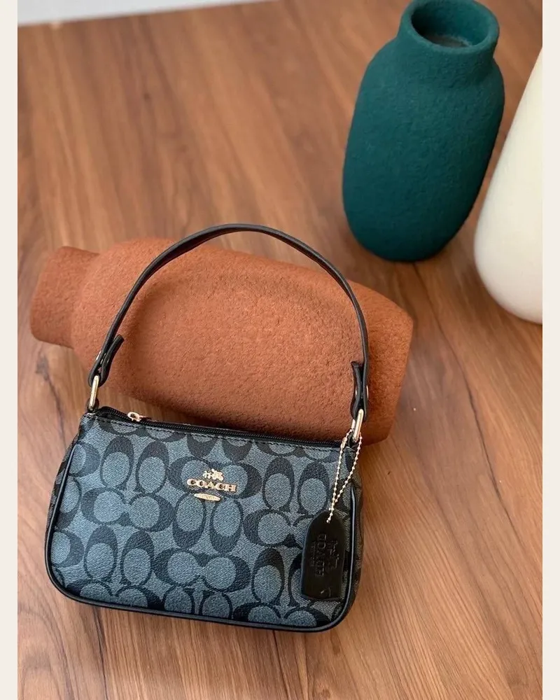 شنطة كتف صغيرة بسحاب 3