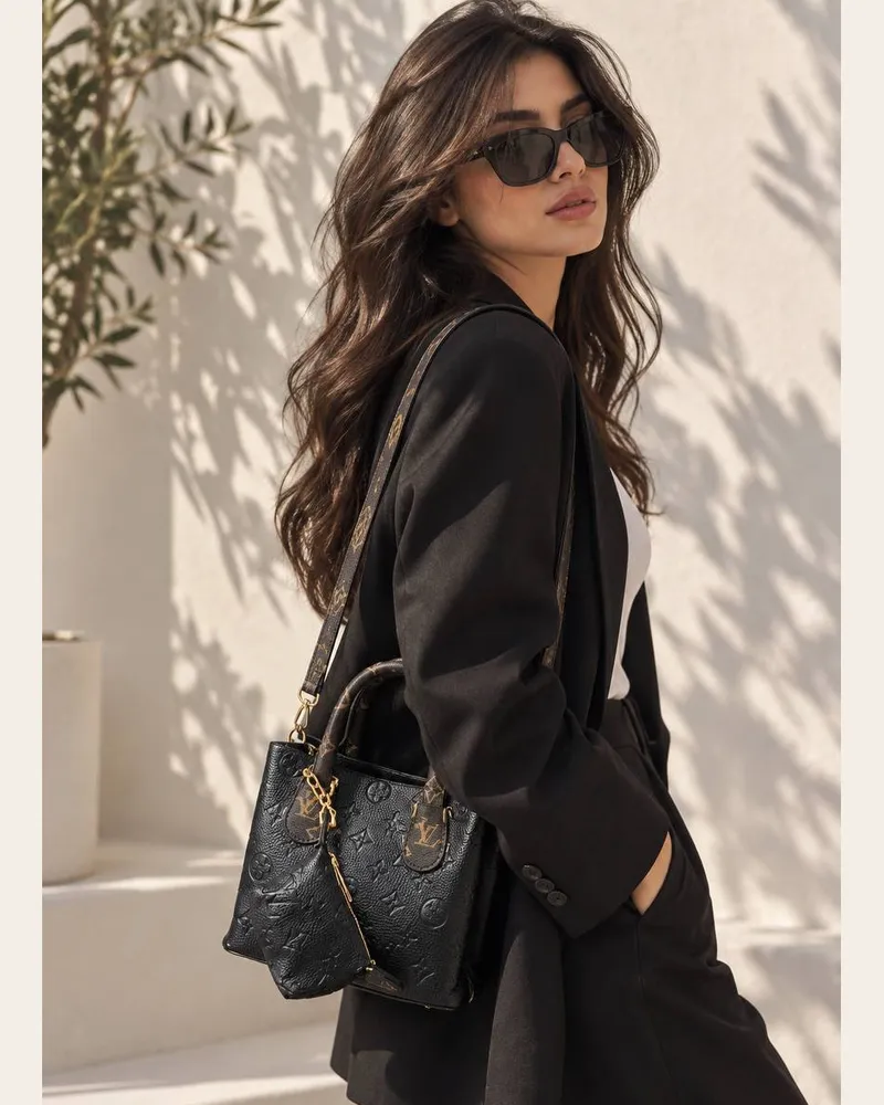 شنطة يد صغيرة منقوشة بحافظة 1